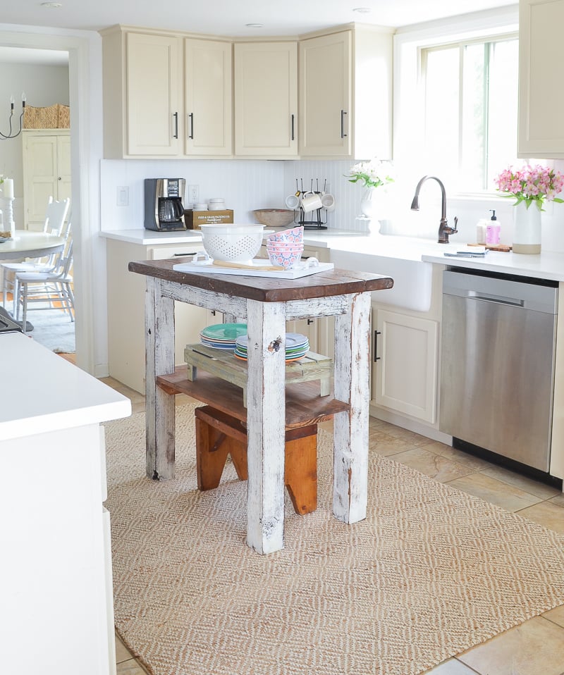 Small l shaped kitchen with island, the kitchen is often considered the heart of the house, where families gather to cook, eat, and socialize.