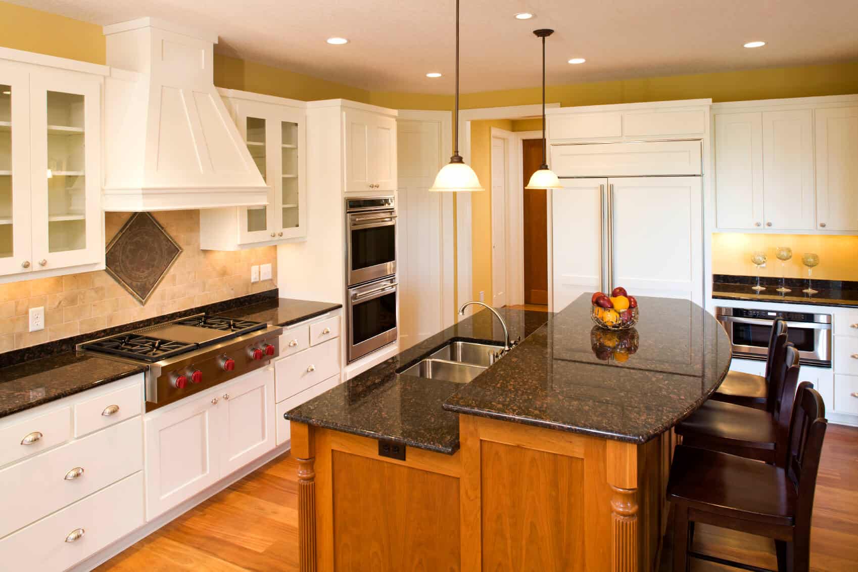 Small l shaped kitchen with island, the kitchen is often considered the heart of the house, where families gather to cook, eat, and socialize.