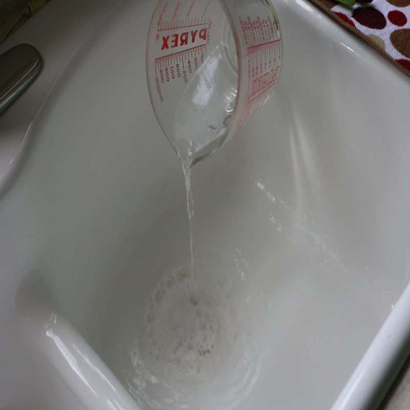 boiling water down kitchen sink